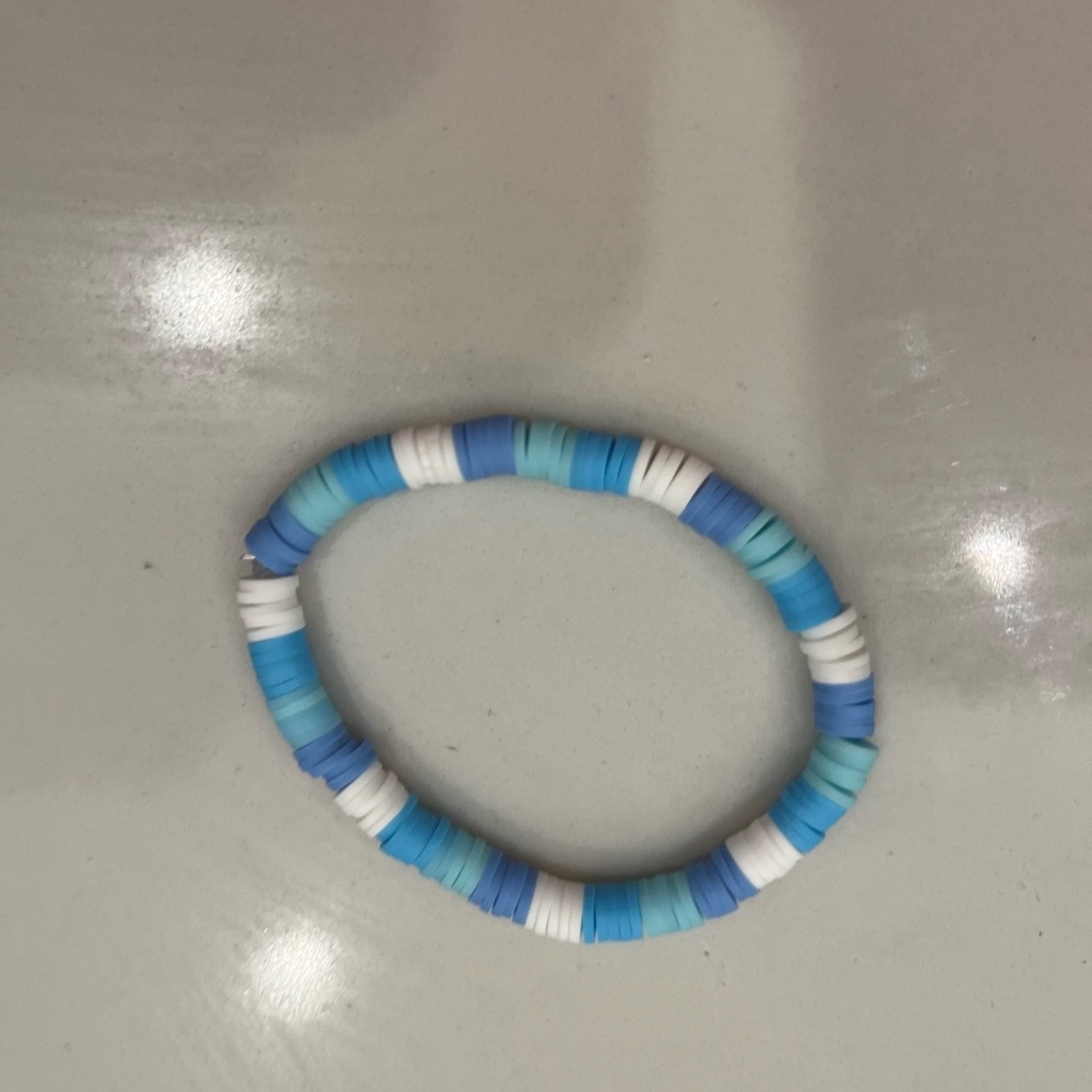 Blue light blue and white clay bead bracelet